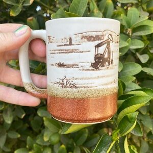 Cute pottery mug oil fields